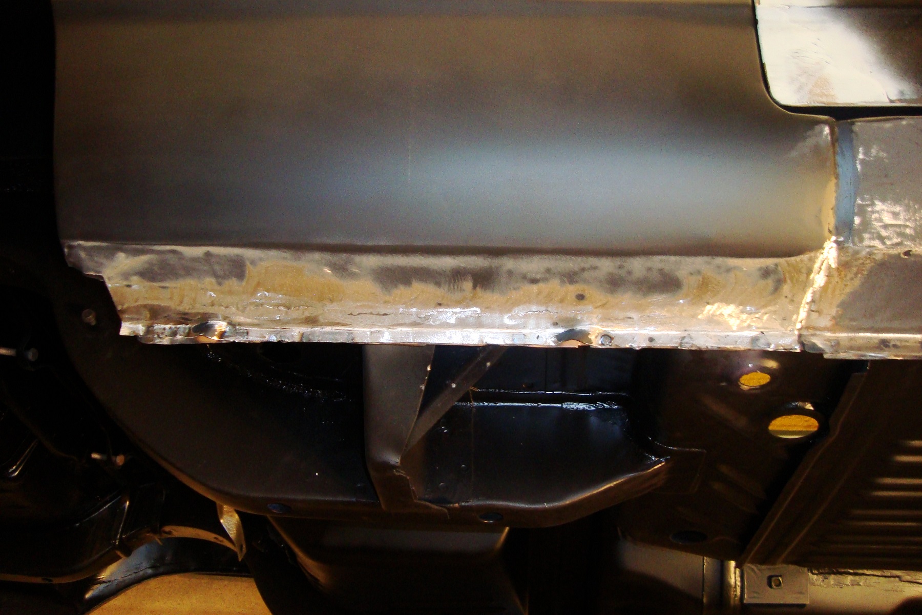 Attached picture rocker pinch weld all finished.JPG